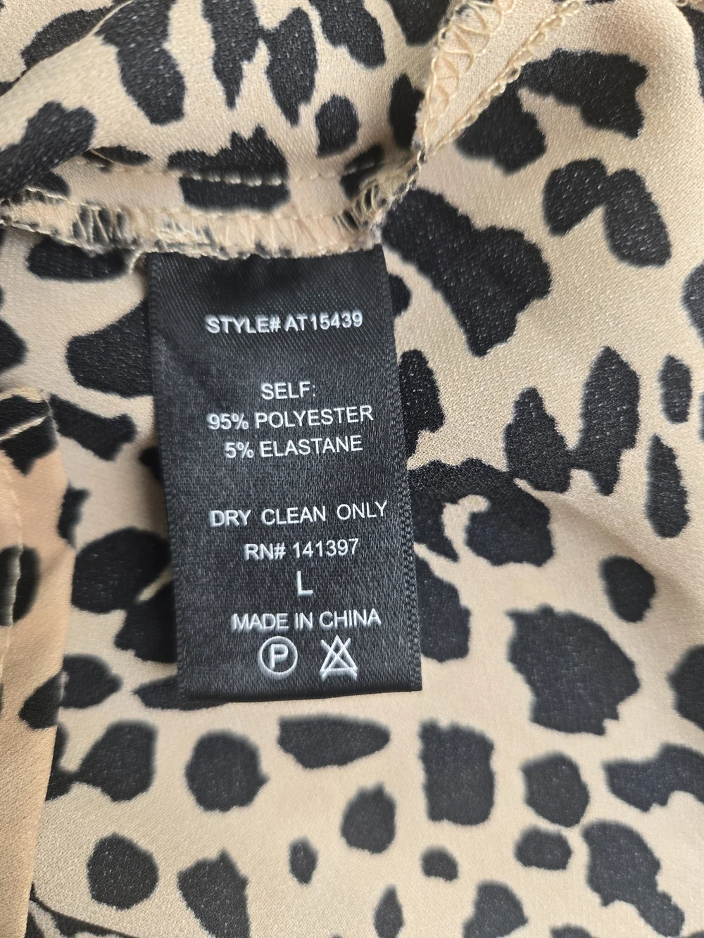 ASTR Tan and Black Leopard-Print Peplum Blouse